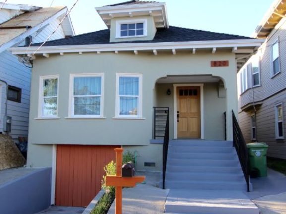 After: FACE LIFT ! New railing, new windows, new door, new landscaping, fixed dry rot new roof and fixed the steps.